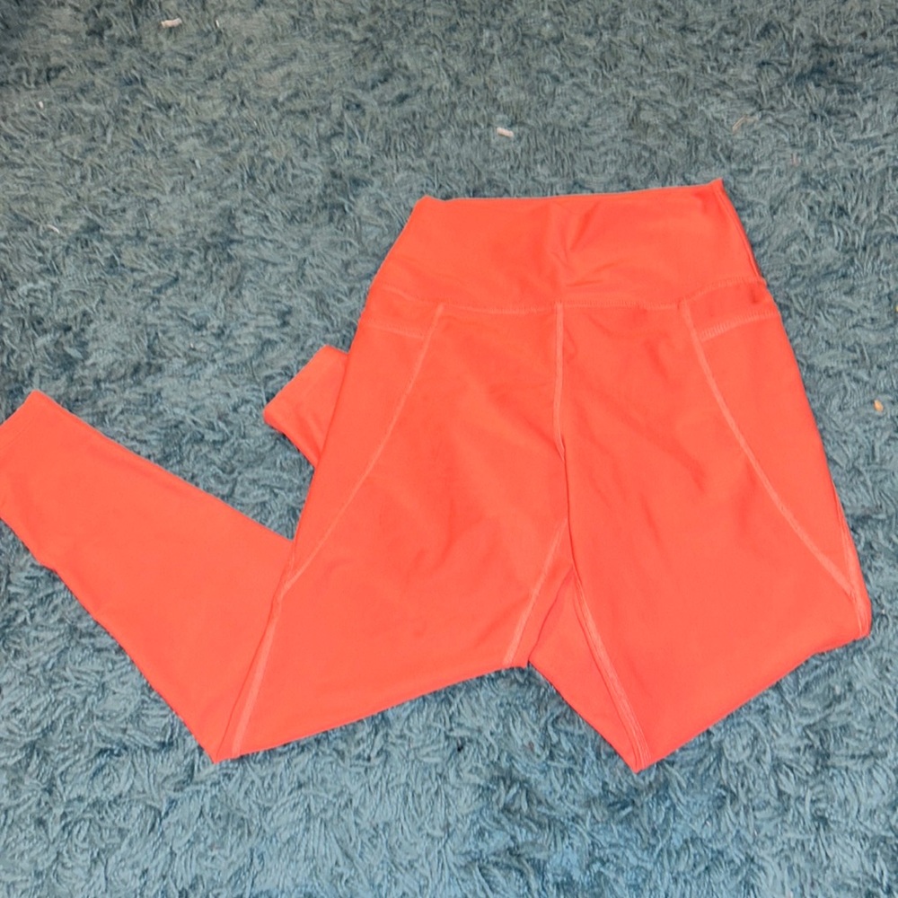 shimmery orange/peach leggings with pockets